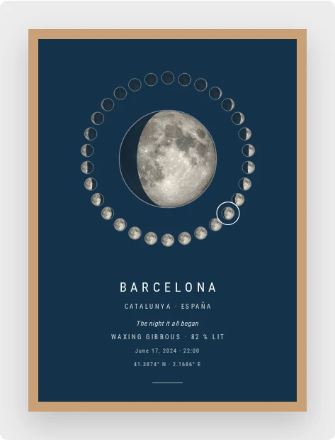 Framed moon phase poster in natural wood: the waxing gibbous moon at the centre, the twenty-nine nights of the lunar month in a ring around it, under “Barcelona · Catalunya · España”, the caption “The night it all began”, the date and the coordinates