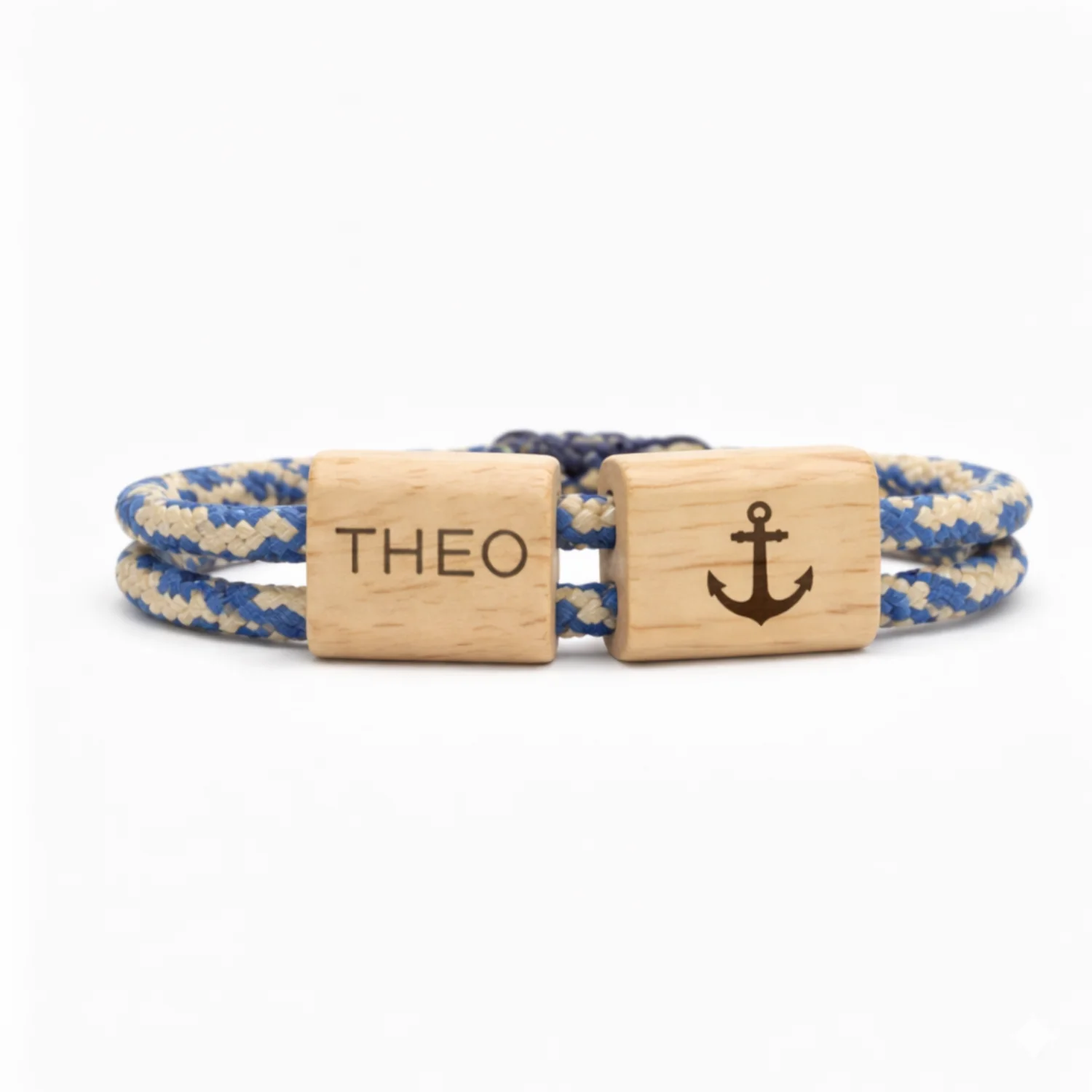 Cordon bleu et écru, passants gravés du prénom THEO et d'une ancre marine