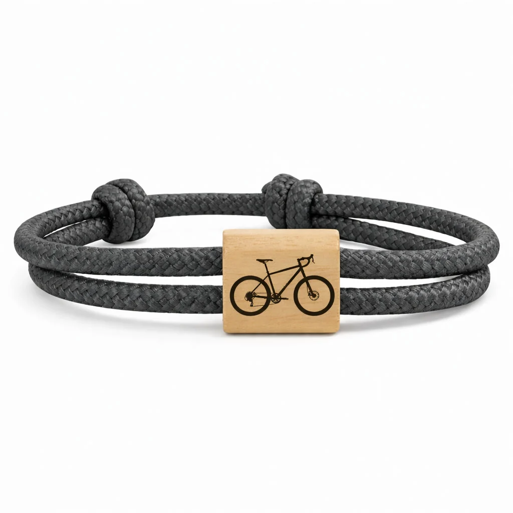 Silhouette de vélo gravel gravée sur le passant, cordon gris anthracite