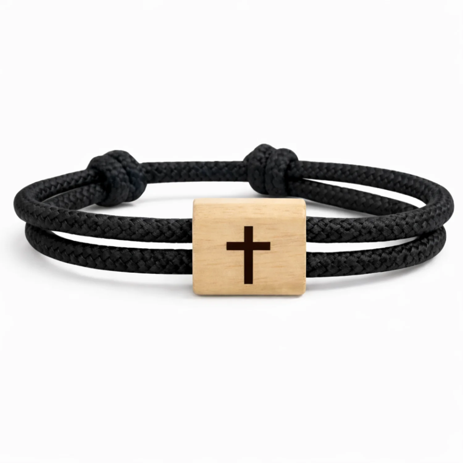 Le même bracelet en cordon noir, croix gravée au centre du passant