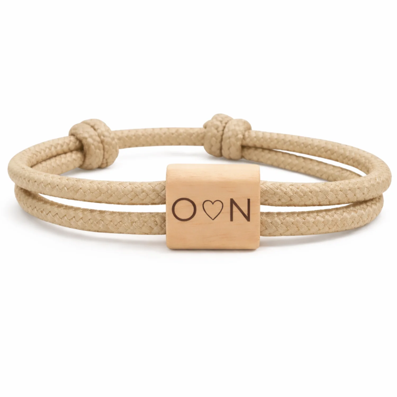 Initiales O et N séparées d'un cœur, cordon beige sable