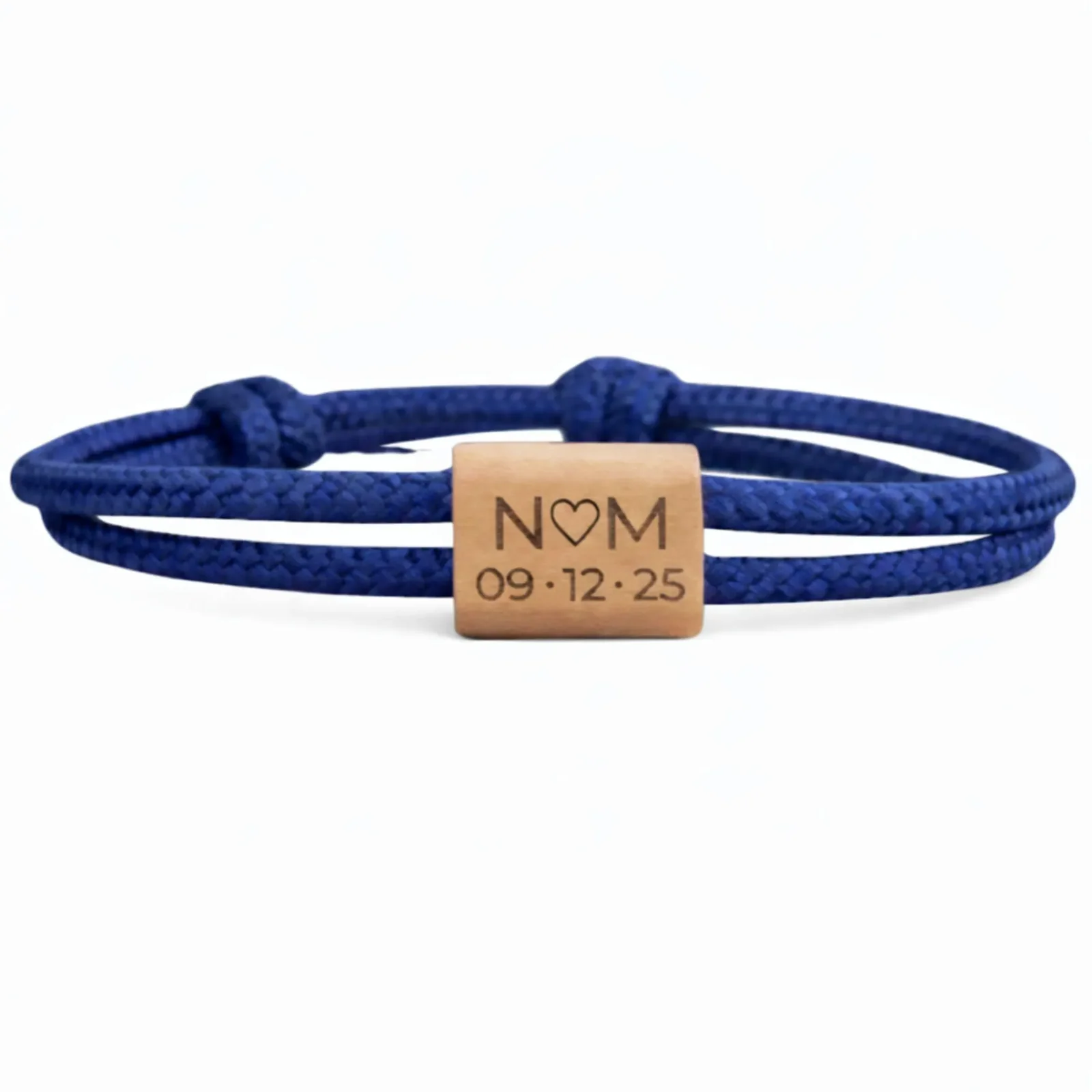 Initiales N et M séparées d'un cœur, date 09 · 12 · 25 en dessous, cordon bleu roi